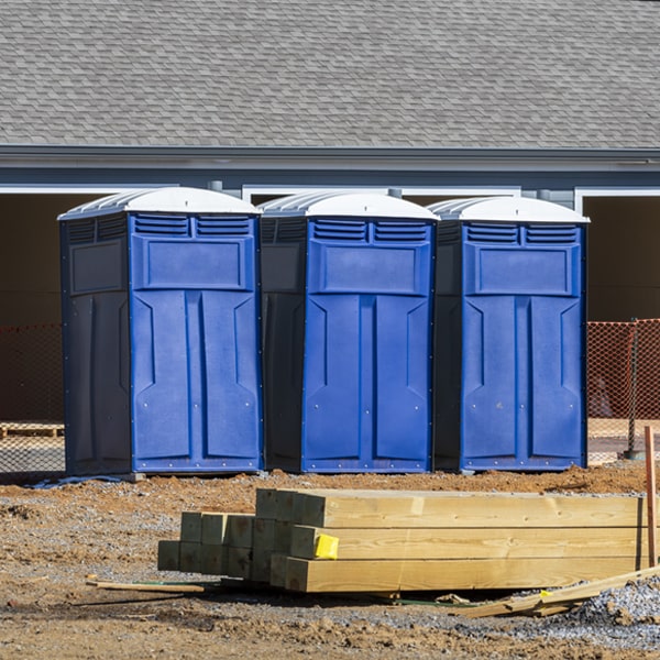 what is the cost difference between standard and deluxe portable restroom rentals in Lexington Michigan